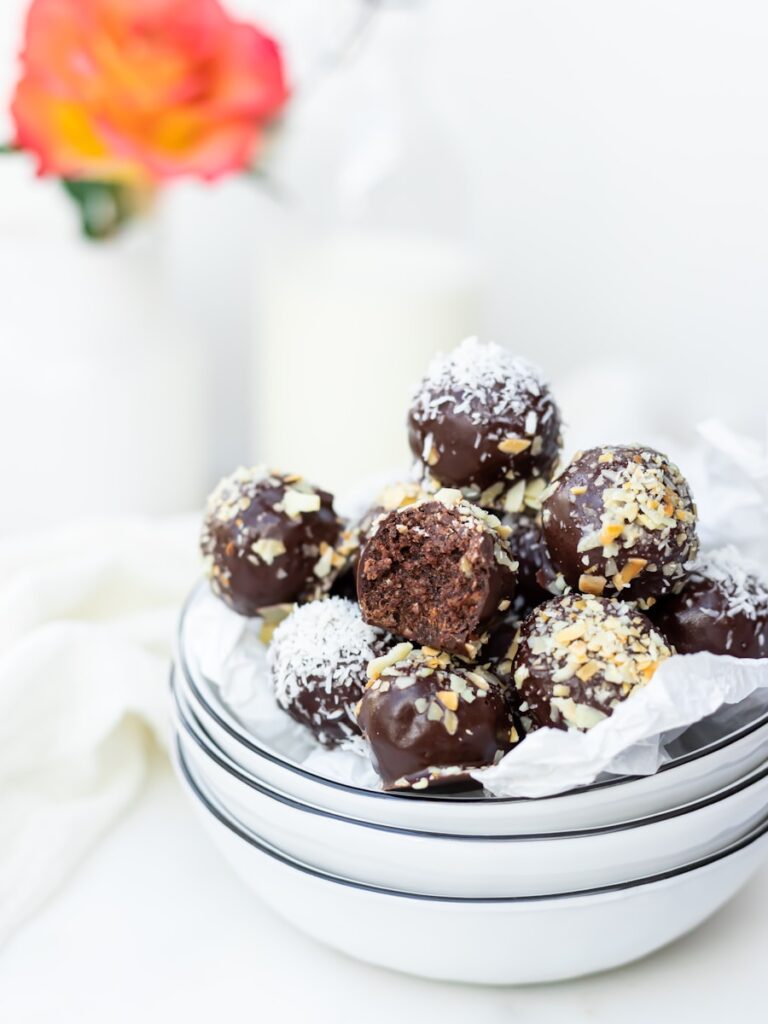 Keto Chocolate Truffles on white ceramic plate, low carb holiday treats